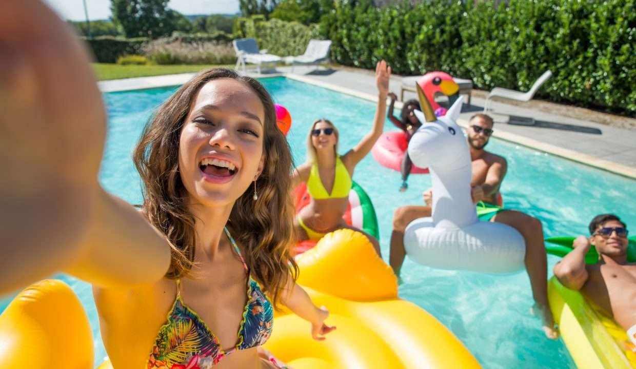 Friends having fun in a swimming pool